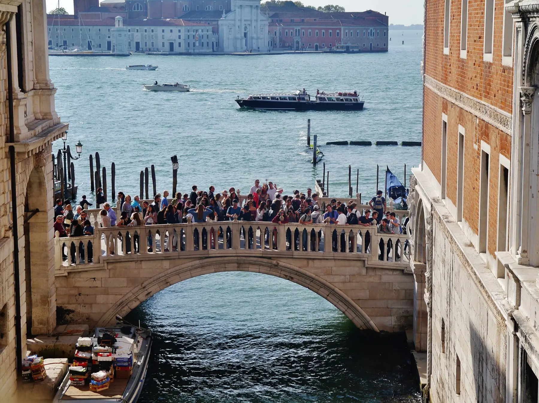 The view of the lagoon through the windows of the Bridge of Sighs